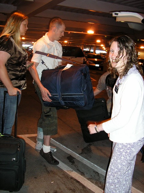 Amy saying how that garment bag was so stuffed she had to pay extra.  Mike agrees!