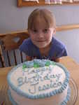 Birthday girl and cake