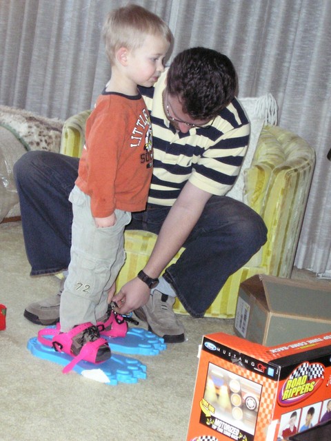 Aaron helping Kyton with the snowshoes/track makers from Missi.  Now we are at Kerrs!