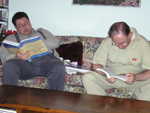 Dad and grandpa Nuffer reading their new books.