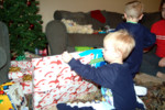 His other big gift was a box of dinosaurs!  Mom spends a lot of time convincing them to pick them up when they are done.