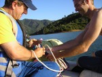 Guy and Dave untangling ropes