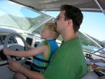 Aaron & Toric driving the boat