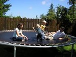 Amy, Aaron, Kyton, and Toric trying out the tramp