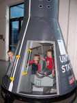 All three in the space capsule