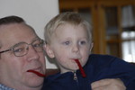 Toric and Grandpa love to share licorice.