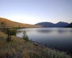 Wide angle shot of Wallowa Lake from the street across from the rental home.