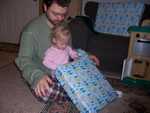 Rhya needed a little help focusing on opening presents otherwise she would have just played with everyone elses!