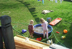 Making a mud pool, and wearing favorite clothes(dress for Glenda, PJs for Jesscia)