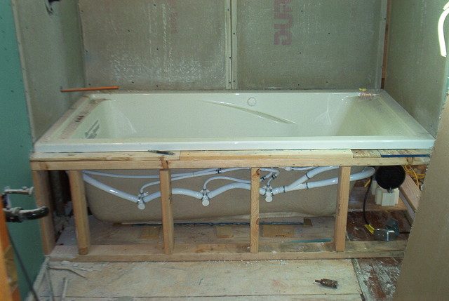 new jetted tub! With new waterproof sheetrock surround