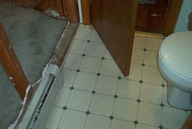 bath Floor Between toilet Seat and Wall.  Shows how cramped the bathroom really was.