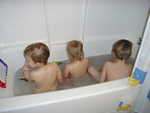 A tub full of camera shy kids!