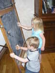 Aaron's family came to visit at Shelly's, and Toric and Callie loved the chalkboard.