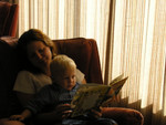 Amy reading to Toric at the beach house.  I love the lighting here!