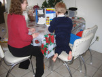 Fun with Paul's playdoh fridge on Christmas.  Heather's watching to make sure he doesn't make TOO much of a mess!