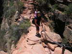 Missi and Amy crossing the thinnest section. 3 ft wide, 2000 ft drop on either side