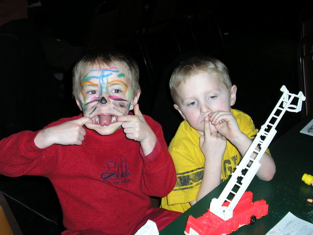 Paul had the face paint too.  I told them they could each bring one toy to Wink's and Toric picked the fire truck.