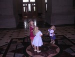 Three girls looking up at the Rotunda