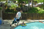 Aaron and Toric jumping into the pool