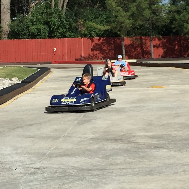 Mary, Bryan and Grandpa on go-carts.   2015-08-05